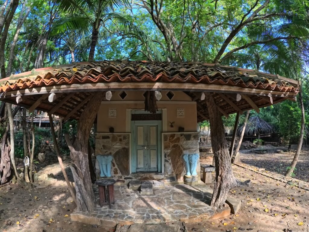 Shrine at Gem River Edge Small Buddhist shrine at Gem River Edge in Kataragama, Sri Lanka